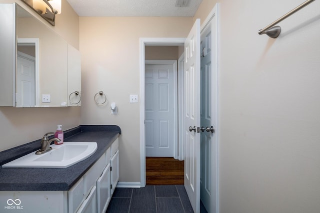 9751 Roxbury Dr, Fishers, IN 46038 - bathroom with vanity and tile patterned flooring