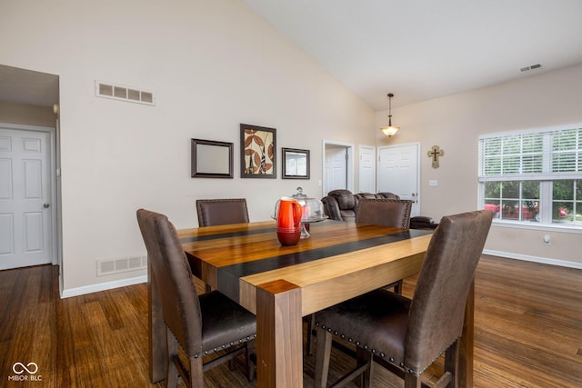 9751 Roxbury Dr, Fishers, IN 46038 - dining space with dark wood finished floors and high vaulted ceiling