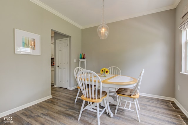 13879 Meadow Grass Way, Fishers, IN 46038 - dining area featuring crown molding, wood finished floors, and healthy amount of natural light