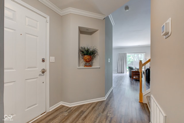 13879 Meadow Grass Way, Fishers, IN 46038 - entrance foyer with wood finished floors and ornamental molding