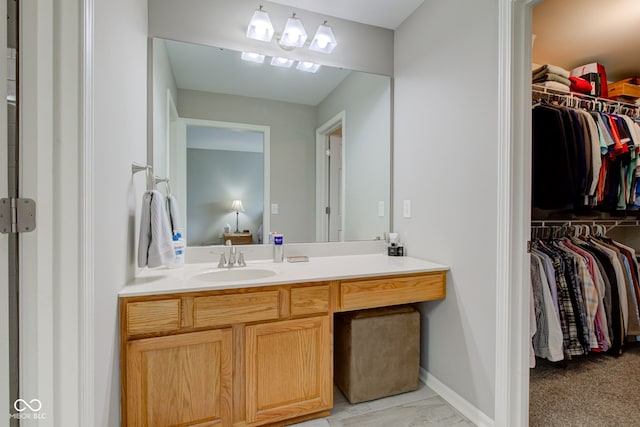 13879 Meadow Grass Way, Fishers, IN 46038 - full bathroom with vanity and a walk in closet
