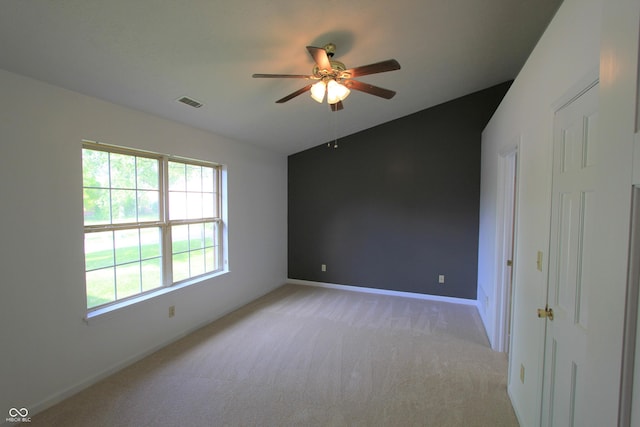 12221 Tallowtree Ct, Indianapolis, IN 46236 - unfurnished room with lofted ceiling, ceiling fan, and light carpet