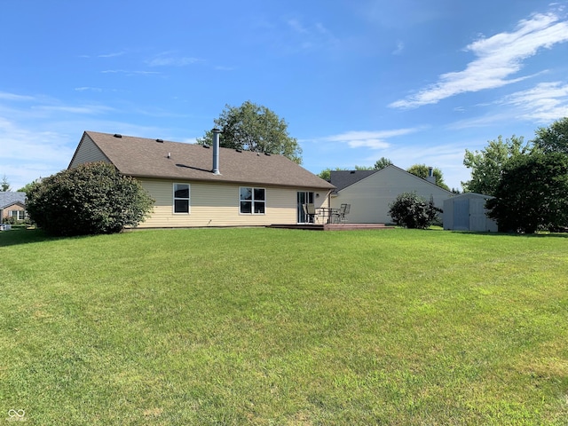 12221 Tallowtree Ct, Indianapolis, IN 46236 - back of house featuring a lawn and a wooden deck