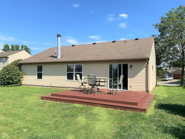 12221 Tallowtree Ct, Indianapolis, IN 46236 - rear view of house featuring a lawn, a deck, a shingled roof, and outdoor dining area