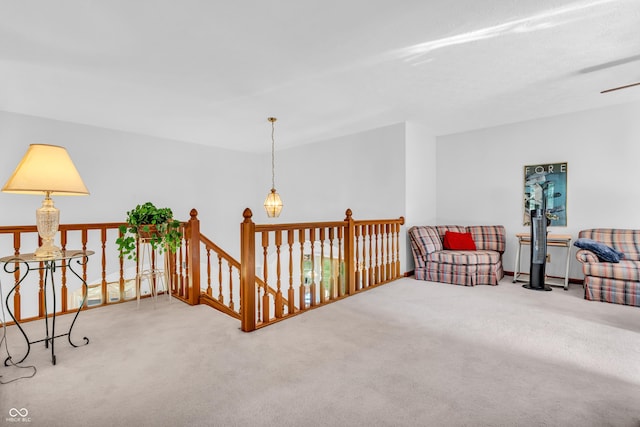 3244 W Burning Tree Rd, Crawfordsville, IN 47933 - sitting room with carpet and an upstairs landing