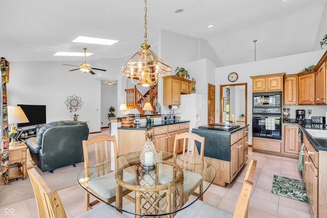 3244 W Burning Tree Rd, Crawfordsville, IN 47933 - dining space with a skylight, high vaulted ceiling, light tile patterned floors, stairs, and a ceiling fan
