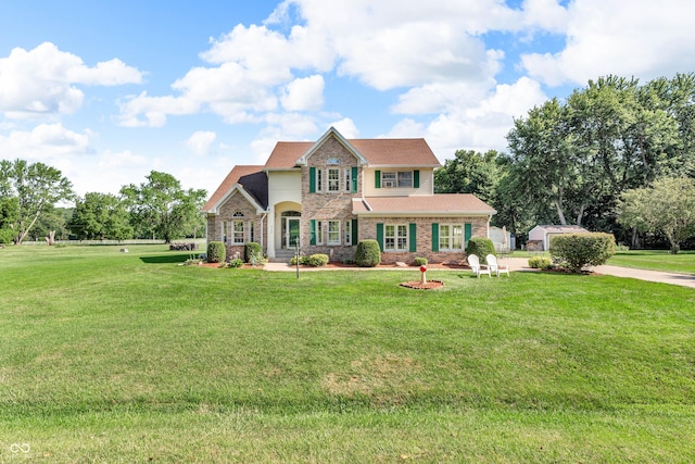 3244 W Burning Tree Rd, Crawfordsville, IN 47933 - view of front of house featuring a front lawn and brick siding
