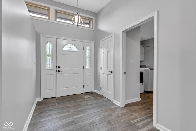 1006 Barry Dr, Lebanon, IN 46052 - foyer entrance featuring washer / dryer and wood finished floors