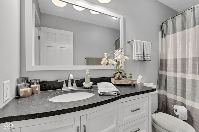 1006 Barry Dr, Lebanon, IN 46052 - bathroom with vanity and a textured ceiling