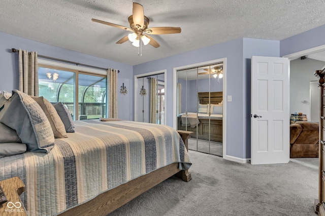 1006 Barry Dr, Lebanon, IN 46052 - bedroom with carpet, a textured ceiling, ceiling fan, two closets, and ensuite bathroom