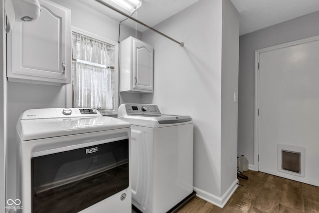 1006 Barry Dr, Lebanon, IN 46052 - laundry room featuring washer and dryer and cabinet space