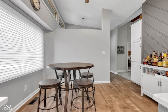 1006 Barry Dr, Lebanon, IN 46052 - dining space featuring light wood finished floors and a dry bar