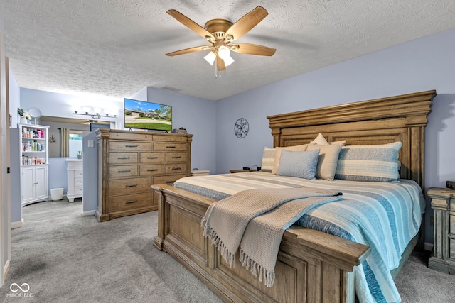 1006 Barry Dr, Lebanon, IN 46052 - bedroom with light colored carpet, a textured ceiling, and a ceiling fan