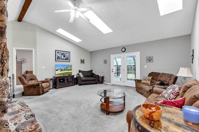 1006 Barry Dr, Lebanon, IN 46052 - living area with a skylight, carpet floors, ceiling fan, beam ceiling, and high vaulted ceiling