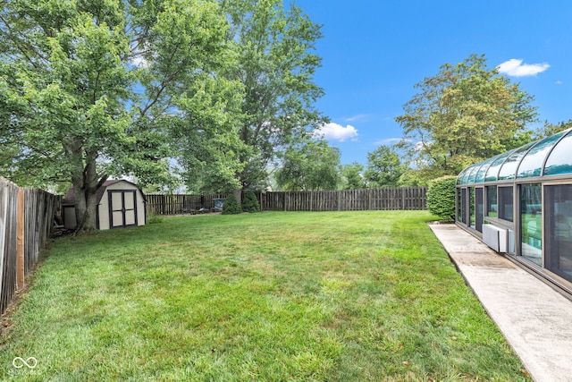 1006 Barry Dr, Lebanon, IN 46052 - fenced backyard with a storage shed and a sunroom