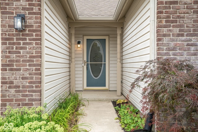 14098 Mimosa Ct, Fishers, IN 46038 - doorway to property with brick siding and a shingled roof