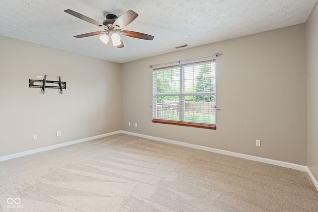 14098 Mimosa Ct, Fishers, IN 46038 - unfurnished room featuring light carpet, a textured ceiling, and ceiling fan