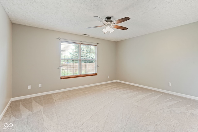 14098 Mimosa Ct, Fishers, IN 46038 - empty room featuring ceiling fan, light colored carpet, and a textured ceiling
