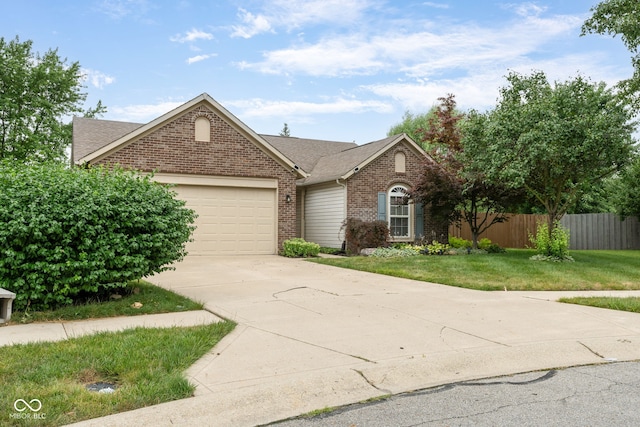 14098 Mimosa Ct, Fishers, IN 46038 - view of front of house with brick siding, an attached garage, driveway, and roof with shingles