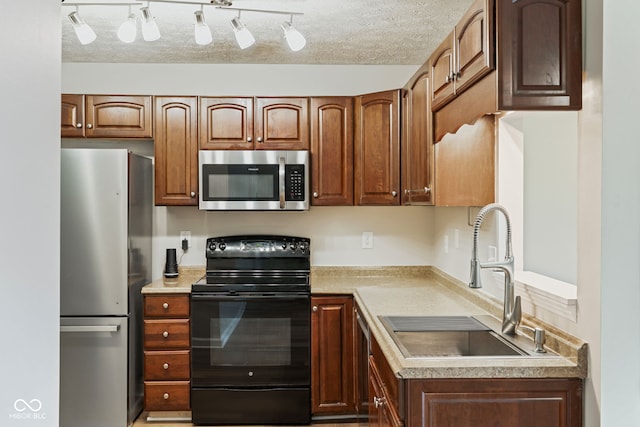 14098 Mimosa Ct, Fishers, IN 46038 - kitchen with appliances with stainless steel finishes and light countertops