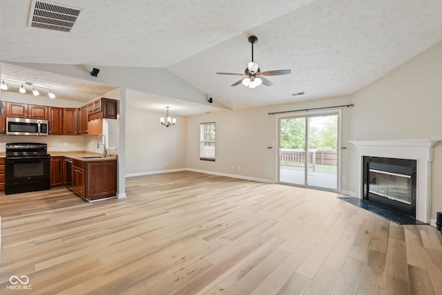 14098 Mimosa Ct, Fishers, IN 46038 - unfurnished living room with a fireplace with flush hearth, ceiling fan, a chandelier, light wood-style floors, and a textured ceiling