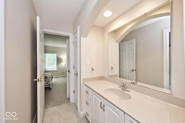 7844 N Timber Run Ct, Indianapolis, IN 46256 - bathroom with vanity and tile patterned flooring