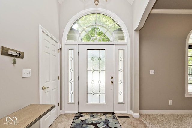 7844 N Timber Run Ct, Indianapolis, IN 46256 - foyer featuring arched walkways and healthy amount of natural light
