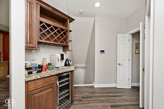 7844 N Timber Run Ct, Indianapolis, IN 46256 - indoor dry bar with wine cooler and dark wood-style floors