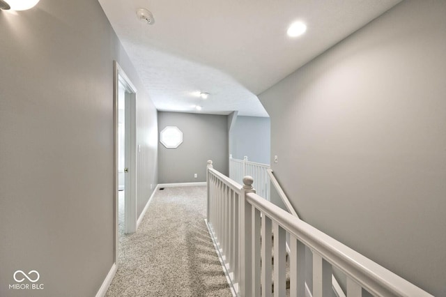 7844 N Timber Run Ct, Indianapolis, IN 46256 - hall with an upstairs landing, carpet floors, and recessed lighting