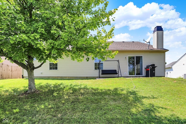 6417 Meadowpond Way, Indianapolis, IN 46235 - rear view of house with a chimney