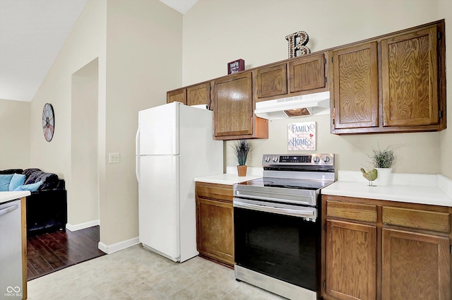 6417 Meadowpond Way, Indianapolis, IN 46235 - kitchen with under cabinet range hood, stainless steel range with electric stovetop, freestanding refrigerator, light countertops, and dishwasher