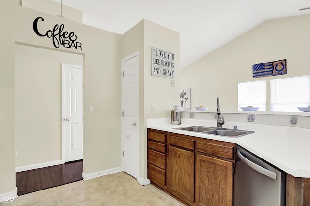6417 Meadowpond Way, Indianapolis, IN 46235 - kitchen featuring dishwasher, vaulted ceiling, light countertops, and brown cabinets