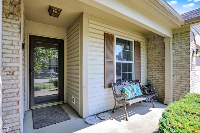 6417 Meadowpond Way, Indianapolis, IN 46235 - entrance to property featuring brick siding and covered porch