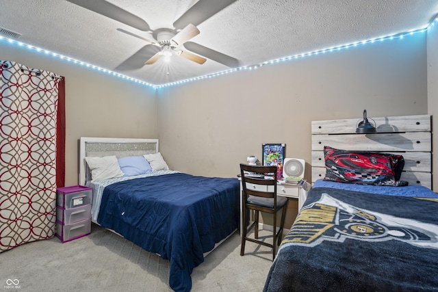 6933 Lohr Way, Indianapolis, IN 46214 - bedroom featuring carpet floors, a textured ceiling, and a ceiling fan