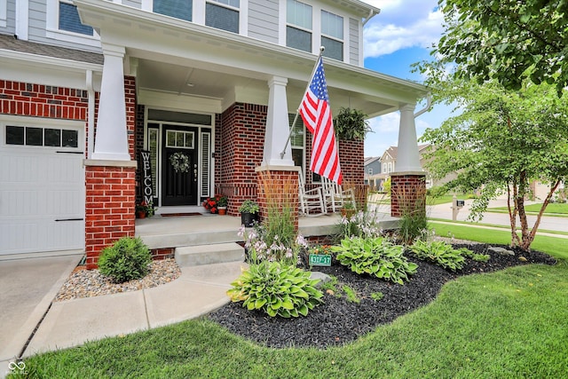 10490 Cleary Trace Dr, Fishers, IN 46040 - doorway to property featuring brick siding and covered porch
