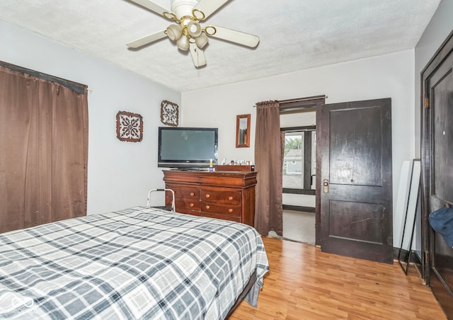 21 N Tremont St, Indianapolis, IN 46222 - bedroom with light wood-style flooring and ceiling fan