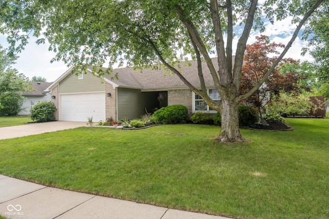12854 Longleaf Ln, Fishers, IN 46038 - view of front facade with brick siding, a garage, a front lawn, driveway, and a shingled roof