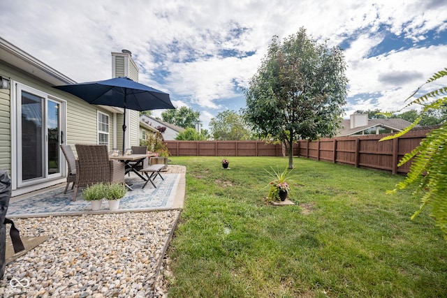 12854 Longleaf Ln, Fishers, IN 46038 - fenced backyard featuring a patio area