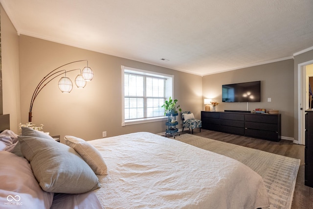 12854 Longleaf Ln, Fishers, IN 46038 - bedroom with crown molding and wood finished floors