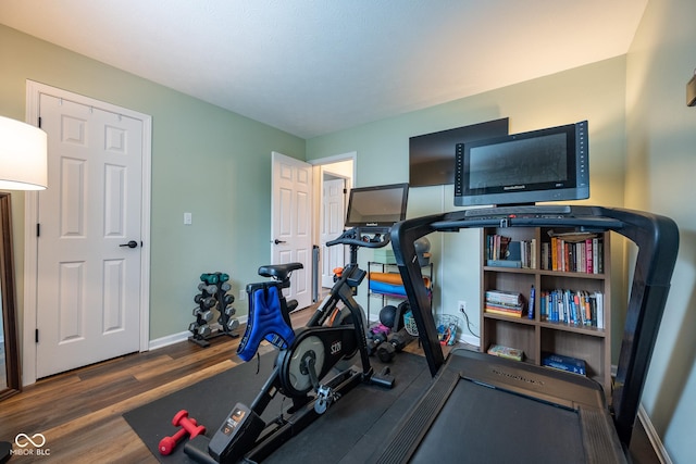 12854 Longleaf Ln, Fishers, IN 46038 - exercise room with wood finished floors and baseboards