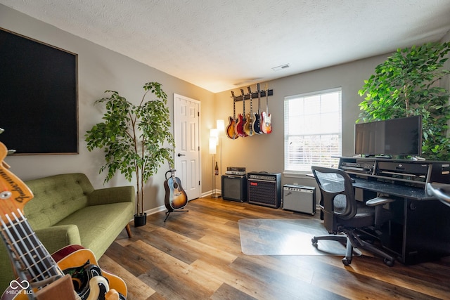 12854 Longleaf Ln, Fishers, IN 46038 - office featuring wood finished floors and a textured ceiling