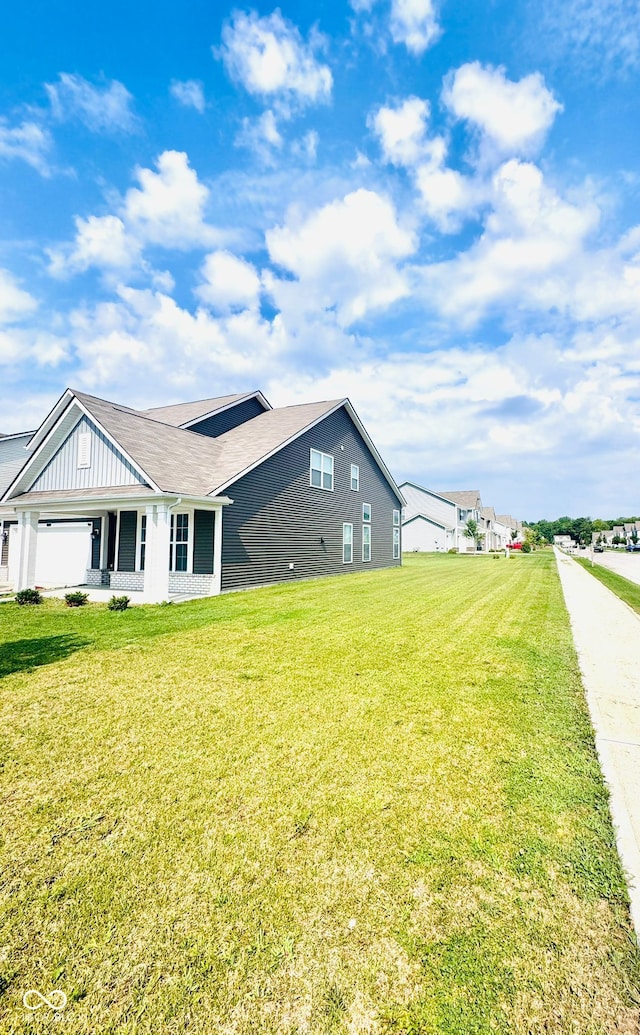 4732 Bethel Creek Blvd, Indianapolis, IN 46239 - view of side of home with a lawn