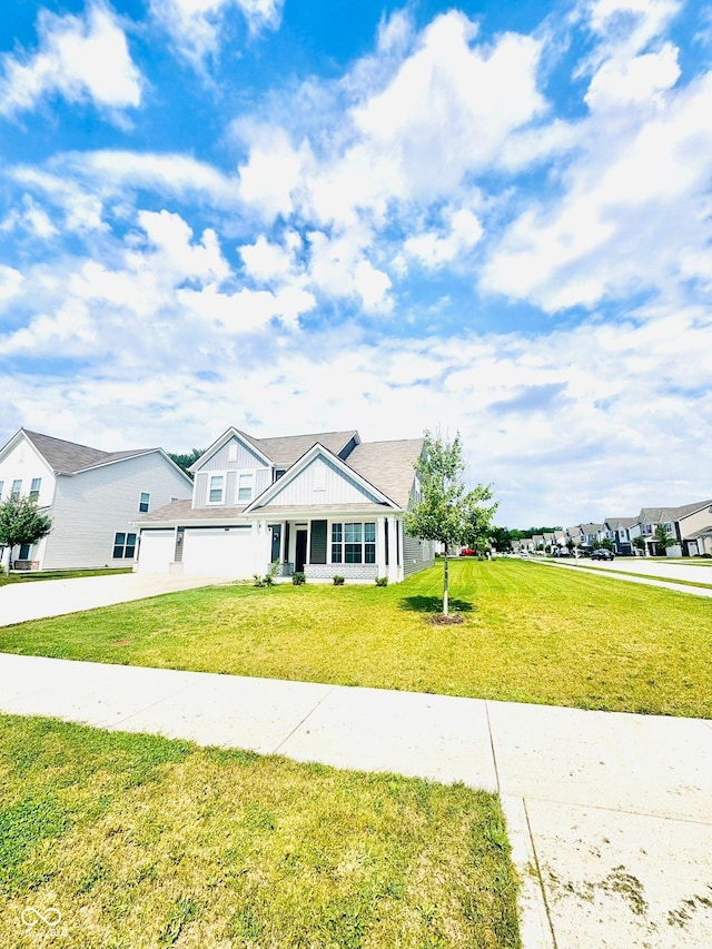 4732 Bethel Creek Blvd, Indianapolis, IN 46239 - view of front facade with a front yard, concrete driveway, and a garage