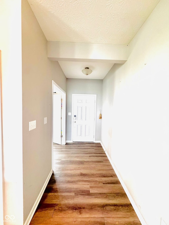 4732 Bethel Creek Blvd, Indianapolis, IN 46239 - hall featuring wood finished floors and a textured ceiling