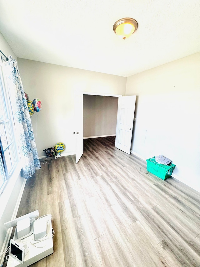 4732 Bethel Creek Blvd, Indianapolis, IN 46239 - spare room featuring wood finished floors and baseboards