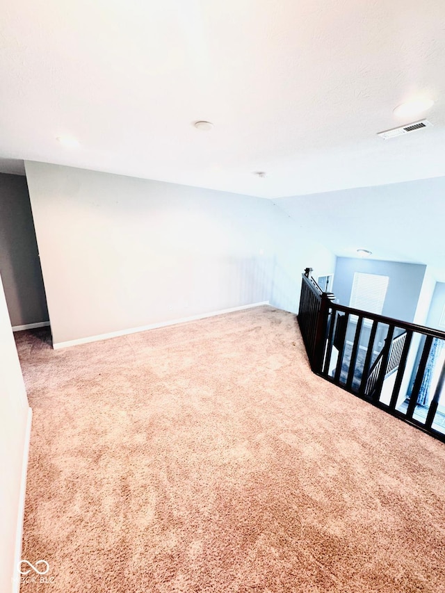 4732 Bethel Creek Blvd, Indianapolis, IN 46239 - carpeted empty room featuring vaulted ceiling and baseboards