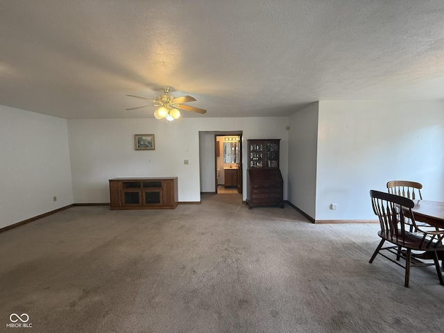 1338 Swan Dr, Franklin, IN 46131 - living room featuring carpet flooring, ceiling fan, and a textured ceiling
