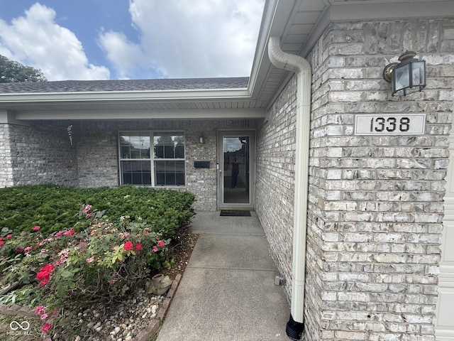 1338 Swan Dr, Franklin, IN 46131 - view of exterior entry featuring brick siding and stone siding