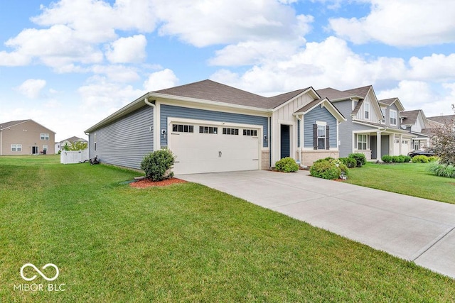 9470 Tobin Cir, Avon, IN 46123 - view of front of property featuring concrete driveway, an attached garage, a front yard, board and batten siding, and brick siding