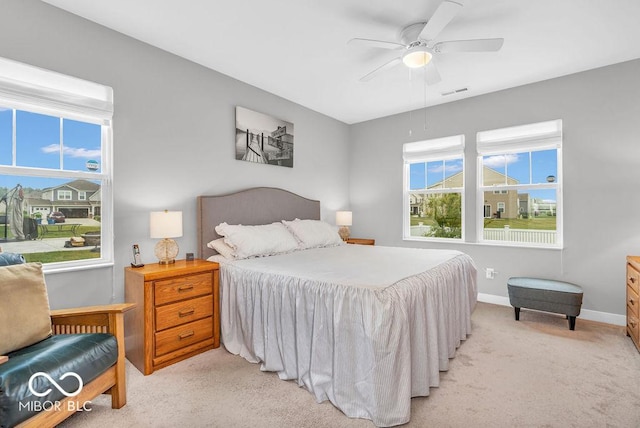 9470 Tobin Cir, Avon, IN 46123 - bedroom featuring light colored carpet and ceiling fan